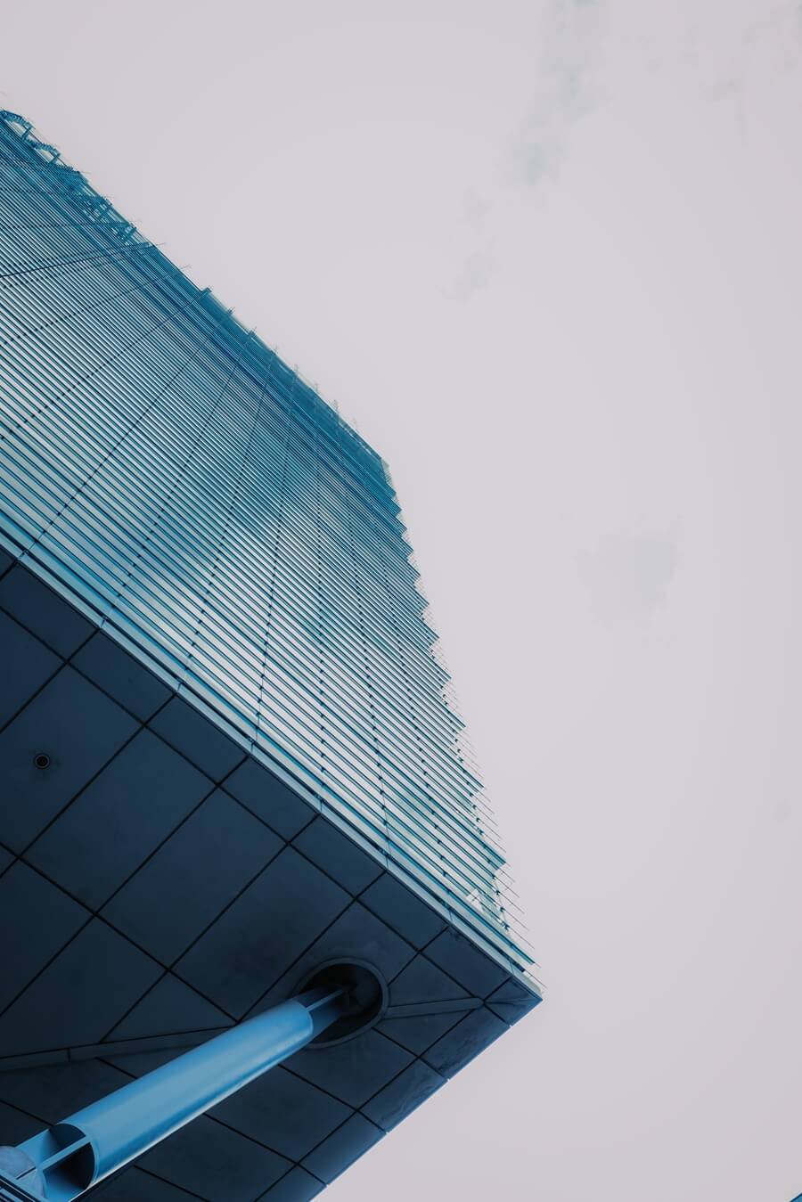 Modern architectural view of No.1 Deansgate, Manchester, showcasing the building’s sleek glass façade and contemporary design.