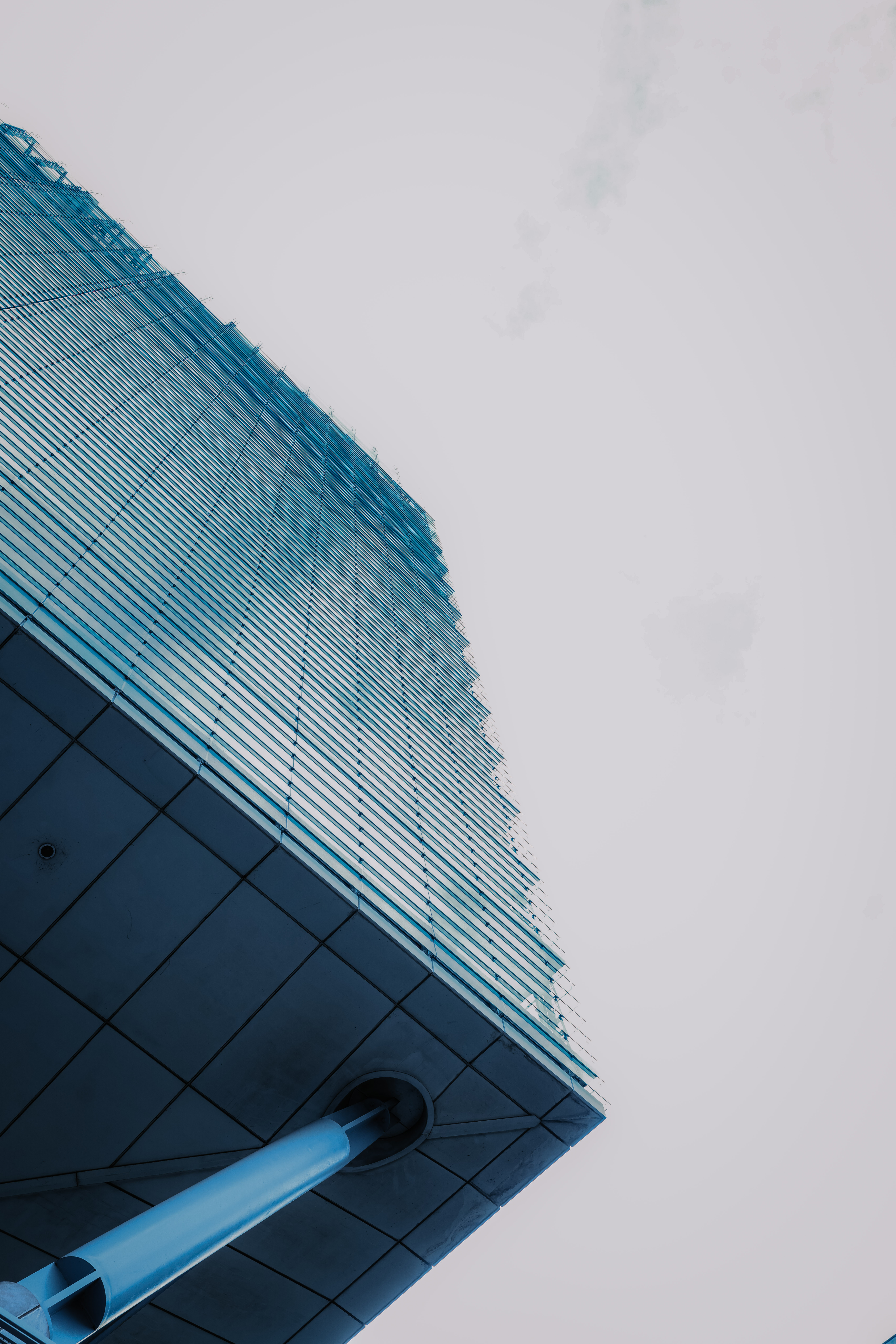 Modern architectural view of No.1 Deansgate, Manchester, showcasing the building’s sleek glass façade and contemporary design.