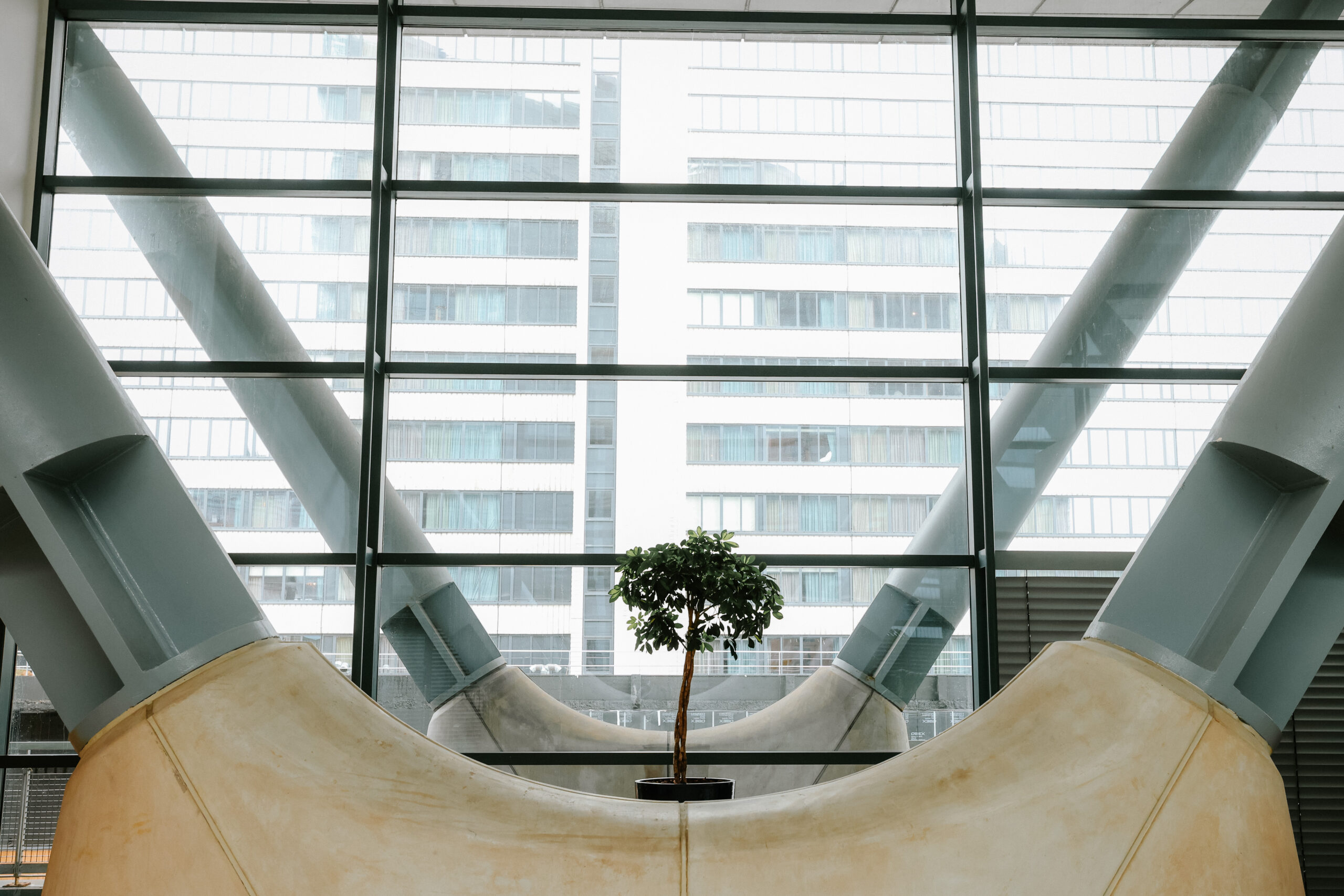 Modern interior reception area at No.1 Deansgate featuring contemporary architecture, clean lines, and elegant lighting.